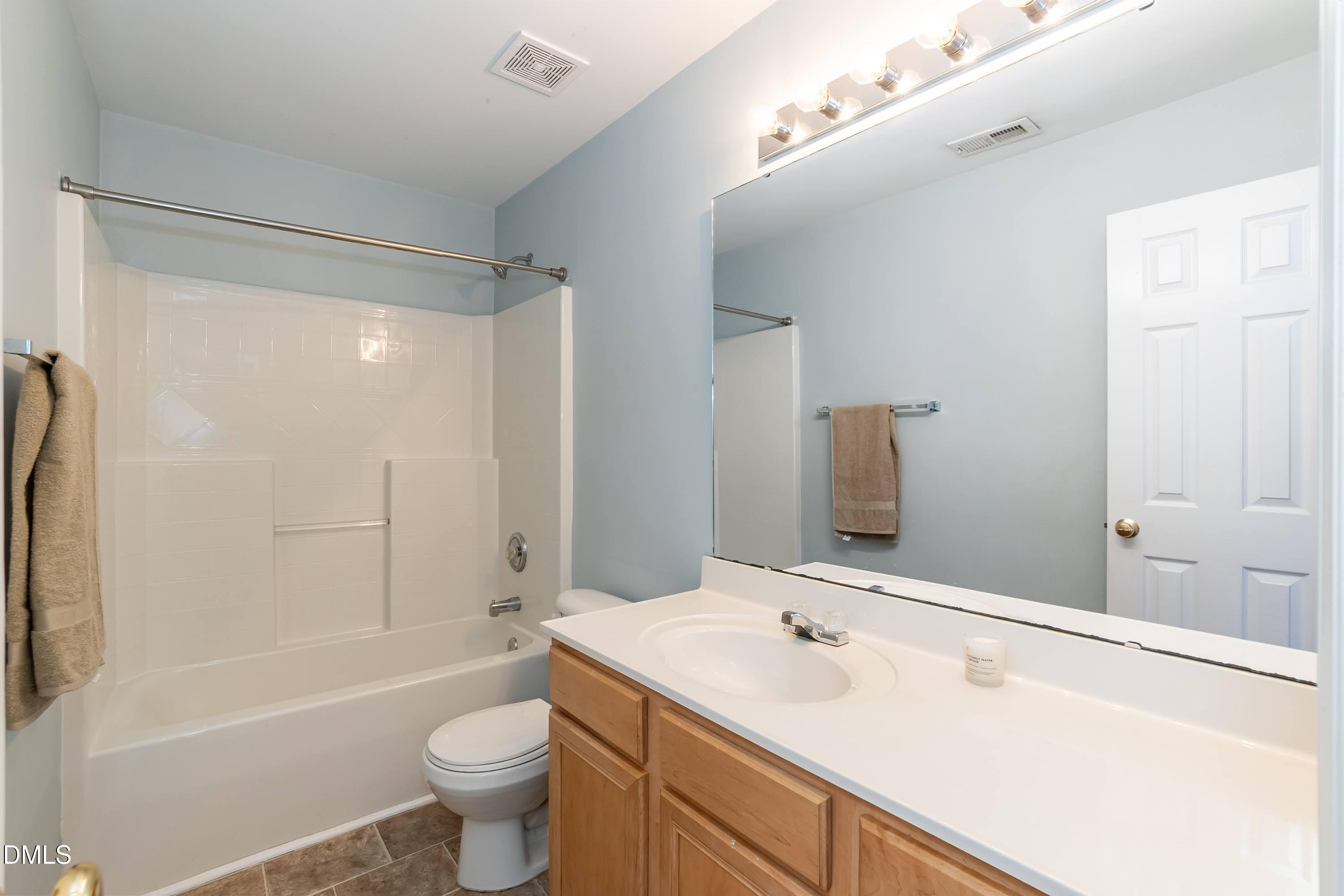 8310 Chimneycap Drive Raleigh, NC 27613 - Photo 31 of 38 Bathroom 02