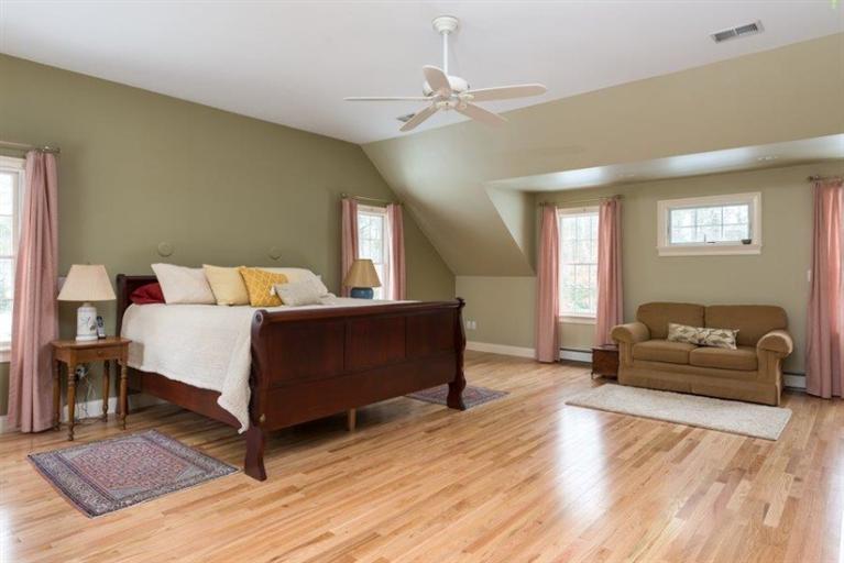 104 Paradise Lane Rochester, MA 02770 - Photo 11 of 15 a bedroom with a bed and window