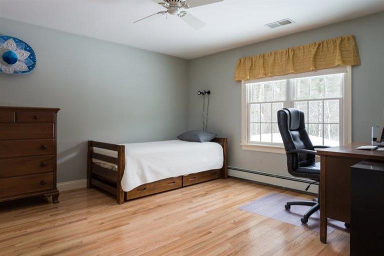 104 Paradise Lane Rochester, MA 02770 - Photo 14 of 15 a bedroom with a bed and a window
