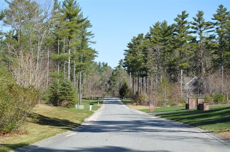 104 Paradise Lane Rochester, MA 02770 - Photo 15 of 15 a backyard of a house with trees