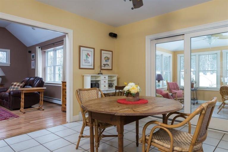 104 Paradise Lane Rochester, MA 02770 - Photo 5 of 15 a view of a dining room with furniture and window