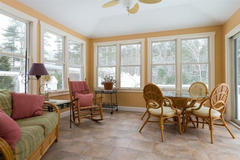 104 Paradise Lane Rochester, MA 02770 - Photo 6 of 15 a living room with furniture and floor to ceiling windows