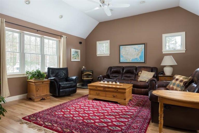 104 Paradise Lane Rochester, MA 02770 - Photo 7 of 15 a living room with furniture or couch and a potted plant