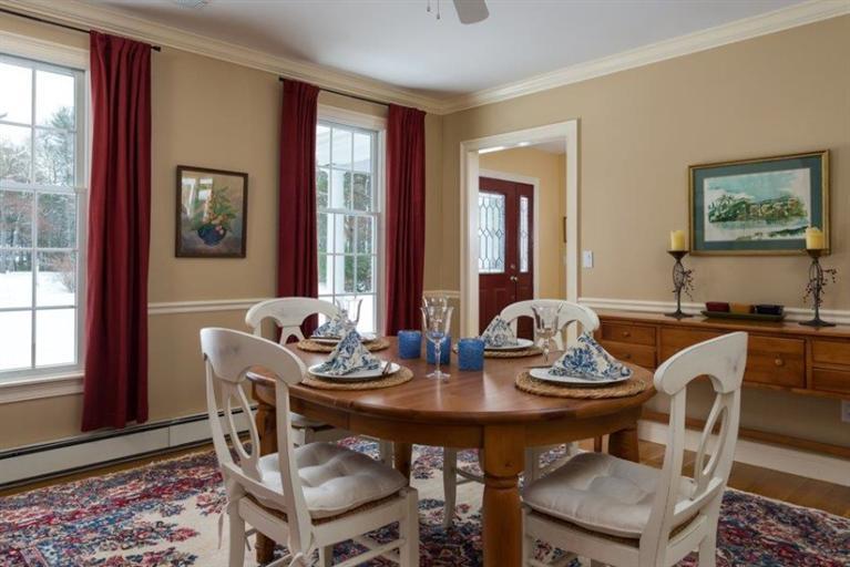 104 Paradise Lane Rochester, MA 02770 - Photo 9 of 15 a view of a dining room with furniture and window