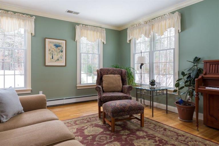 104 Paradise Lane Rochester, MA 02770 - Photo 10 of 15 a living room with furniture and a window