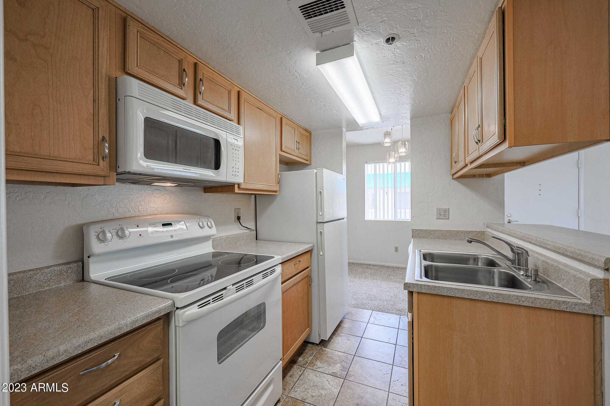 12123 West Bell Road, Unit 206 Surprise, AZ 85378 - Photo 11 of 28 Kitchen