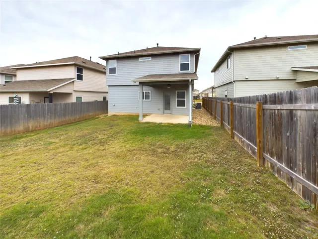 a view of a house with a swimming pool