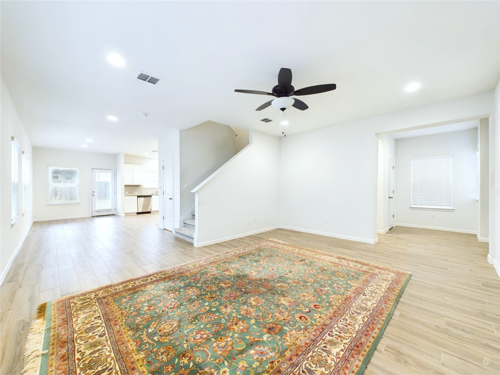 10817 Timber Brook Pass Austin, TX 78747 - Photo 6 of 23 a view of a kitchen with a sink and cabinets