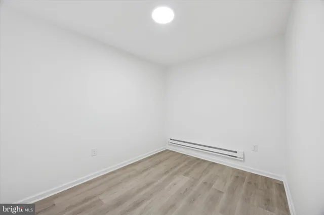 a kitchen with stainless steel appliances granite countertop a stove and a refrigerator