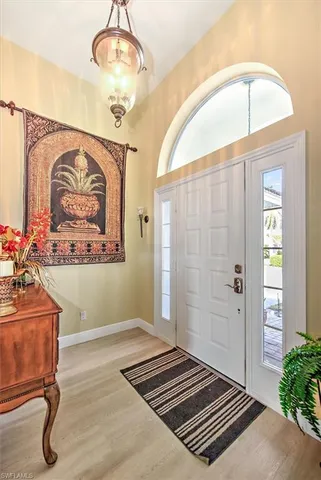 a view of an entryway with a workspace