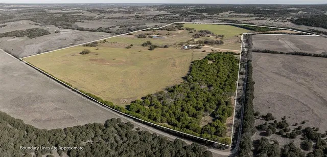 an aerial view of mountain with beach