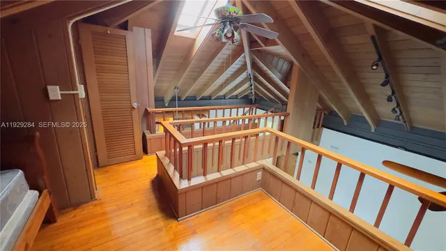 a view of staircase with a small stove