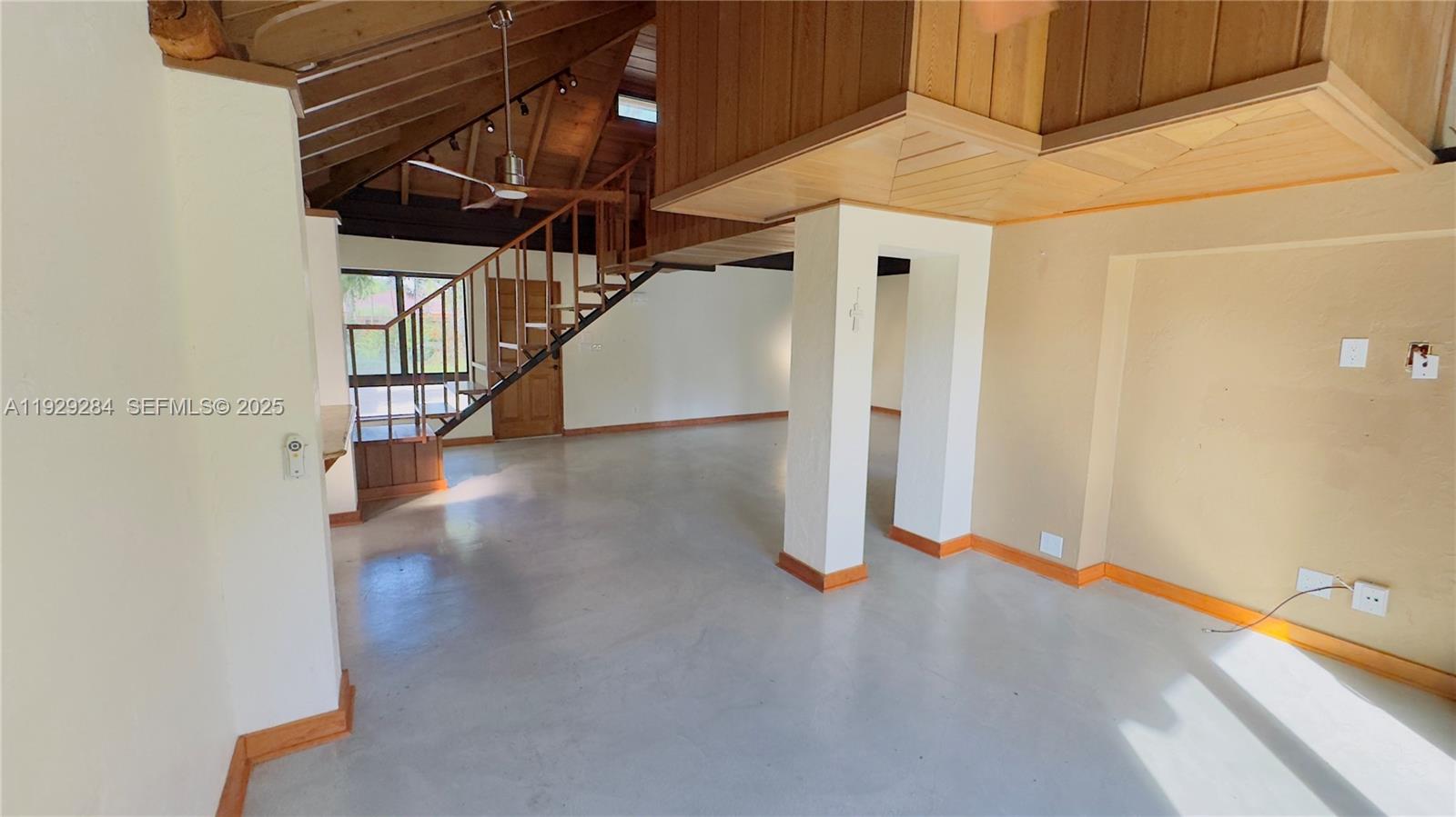 18350 Southwest 214th Street Miami, FL 33187 - Photo 18 of 24 a view of a hallway with staircase