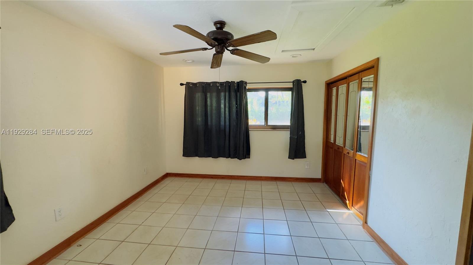 18350 Southwest 214th Street Miami, FL 33187 - Photo 4 of 24 a view of an entryway