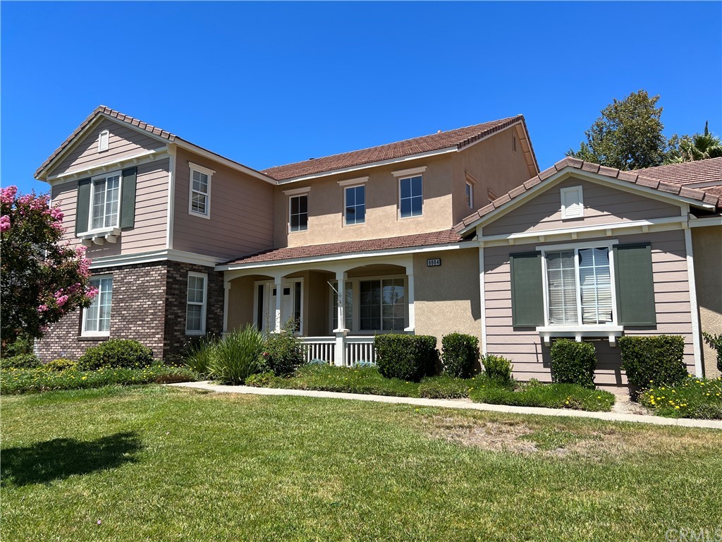 8804 Windmill Place Riverside, CA 92508 - Photo 1 of 1 a front view of a house with a yard