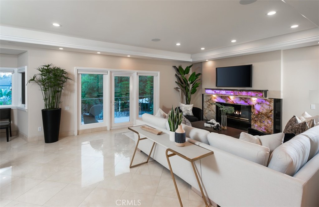 10282 Ambervale Lane North Tustin, CA 92705 - Photo 17 of 41 a living room with furniture and a flat screen tv