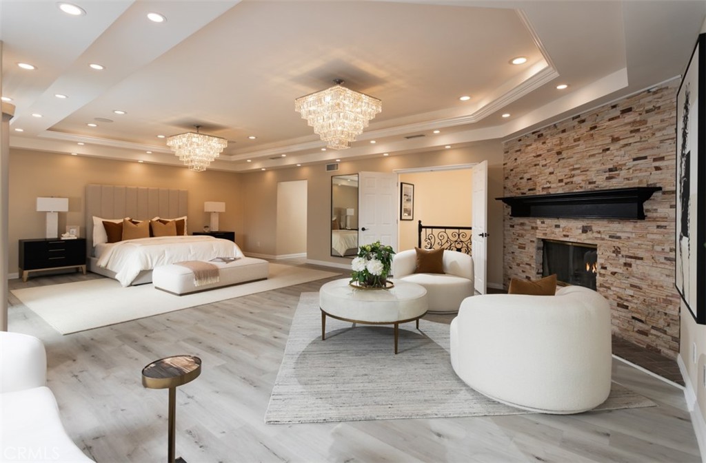 10282 Ambervale Lane North Tustin, CA 92705 - Photo 20 of 41 a large living room with furniture and a fireplace