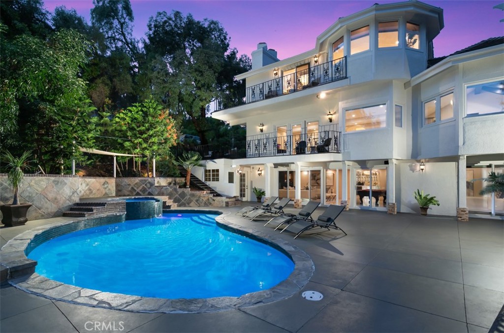 10282 Ambervale Lane North Tustin, CA 92705 - Photo 2 of 41 a front view of a house with swimming pool