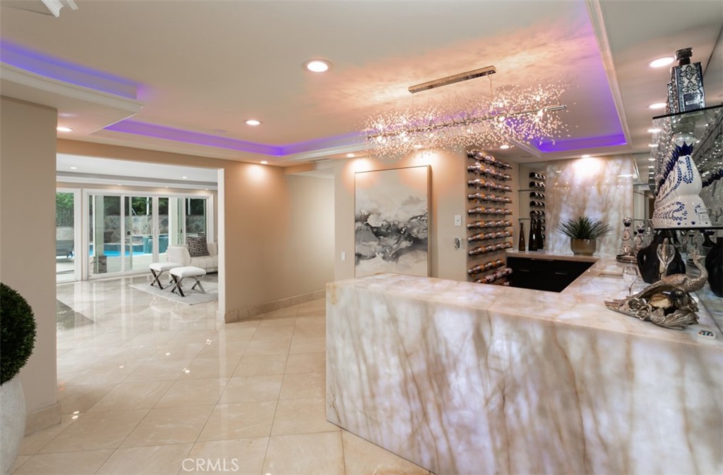 10282 Ambervale Lane North Tustin, CA 92705 - Photo 24 of 41 a very nice looking room with a large window and chandelier