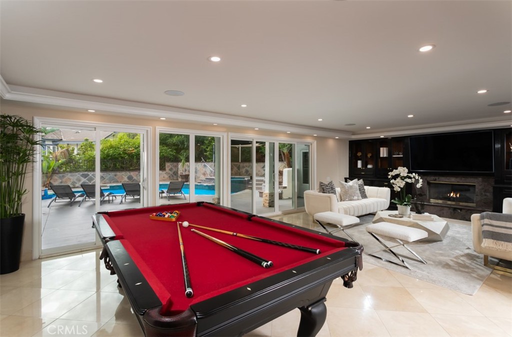 10282 Ambervale Lane North Tustin, CA 92705 - Photo 28 of 41 a room with pool table and windows