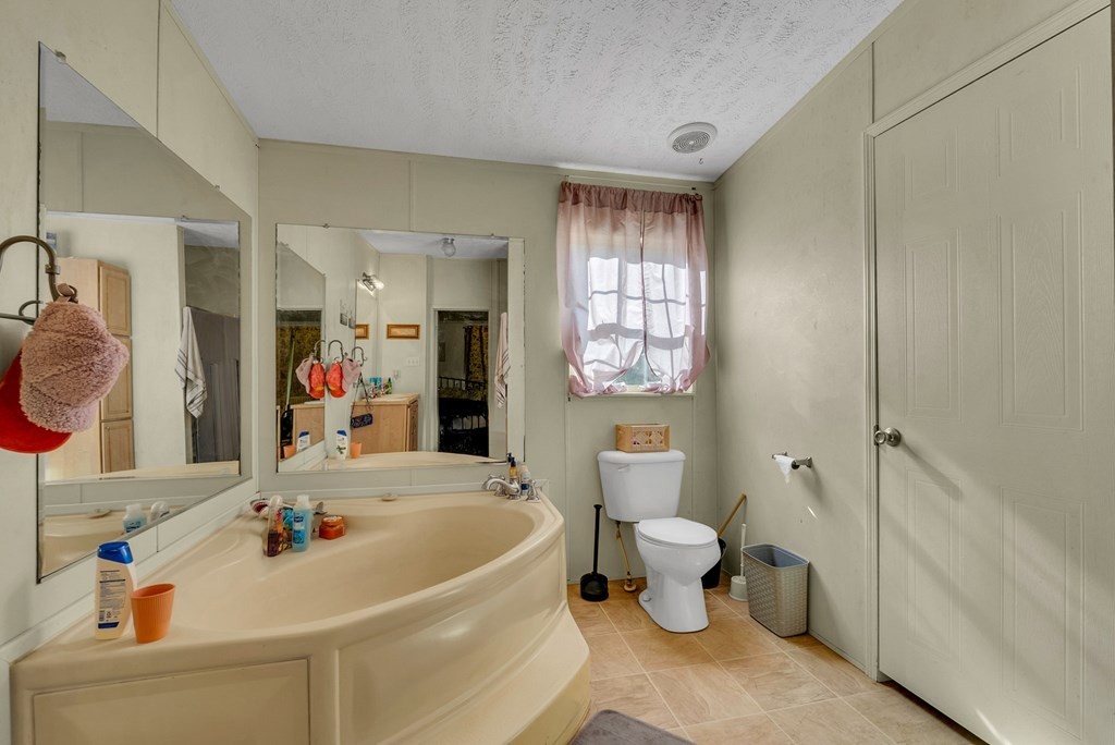 170 Perrigan Lane Sparta, TN 38583 - Photo 15 of 27 a bathroom with a sink toilet and shower