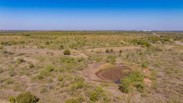 a view of an outdoor space and a mountain view