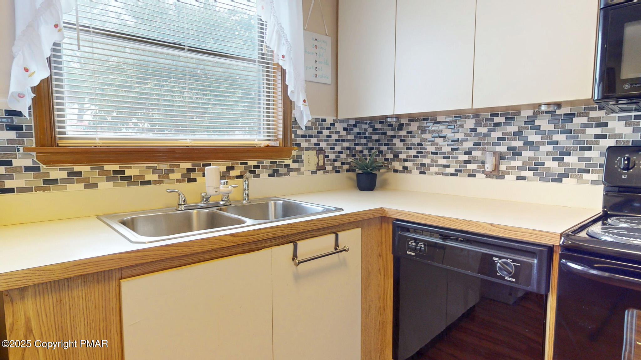 130 Foxfire Drive, Unit 103 Mount Pocono, PA 18344 - Photo 15 of 38 a view of a sink and a window