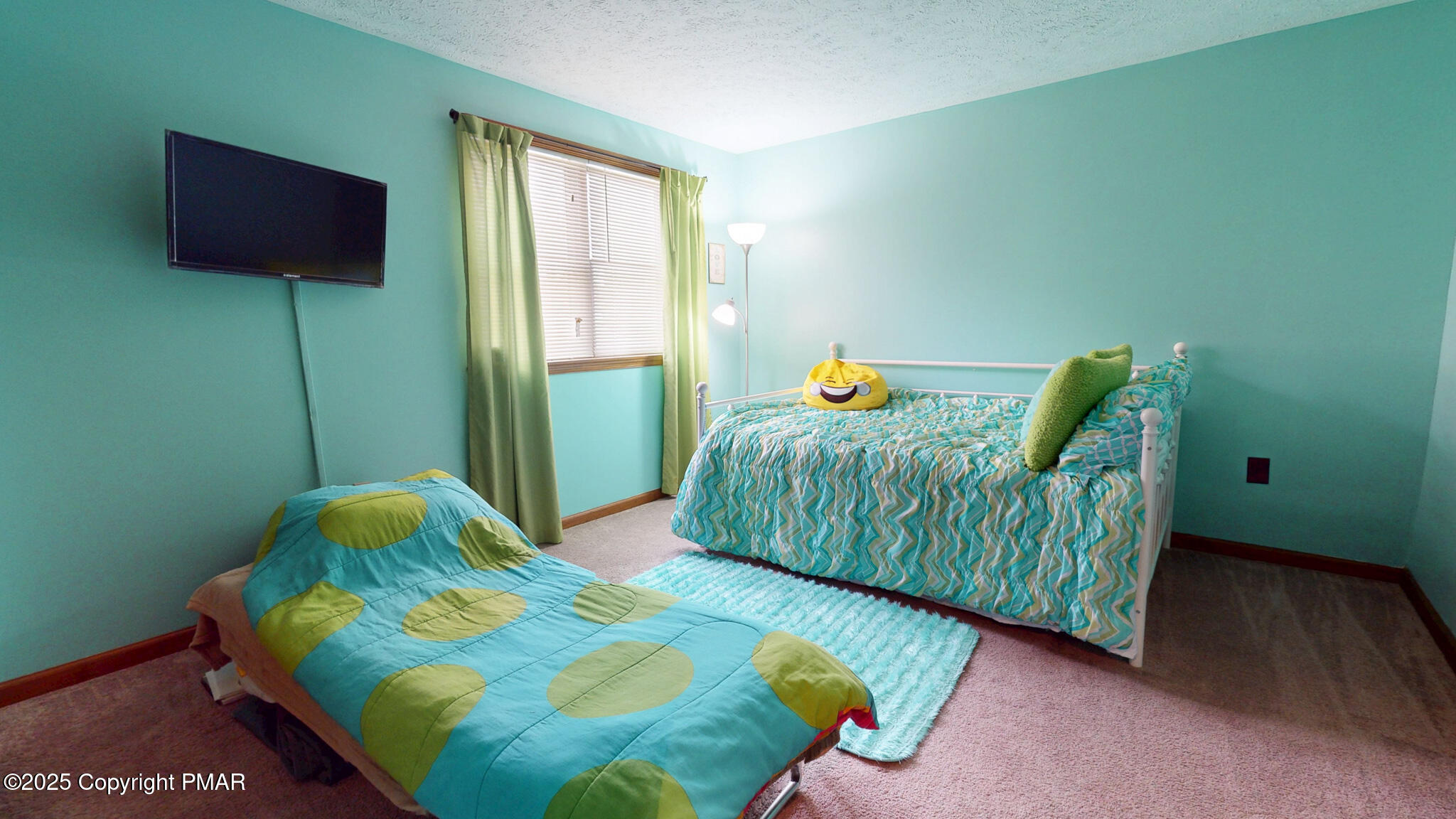 130 Foxfire Drive, Unit 103 Mount Pocono, PA 18344 - Photo 25 of 38 a bedroom with a bed and a window