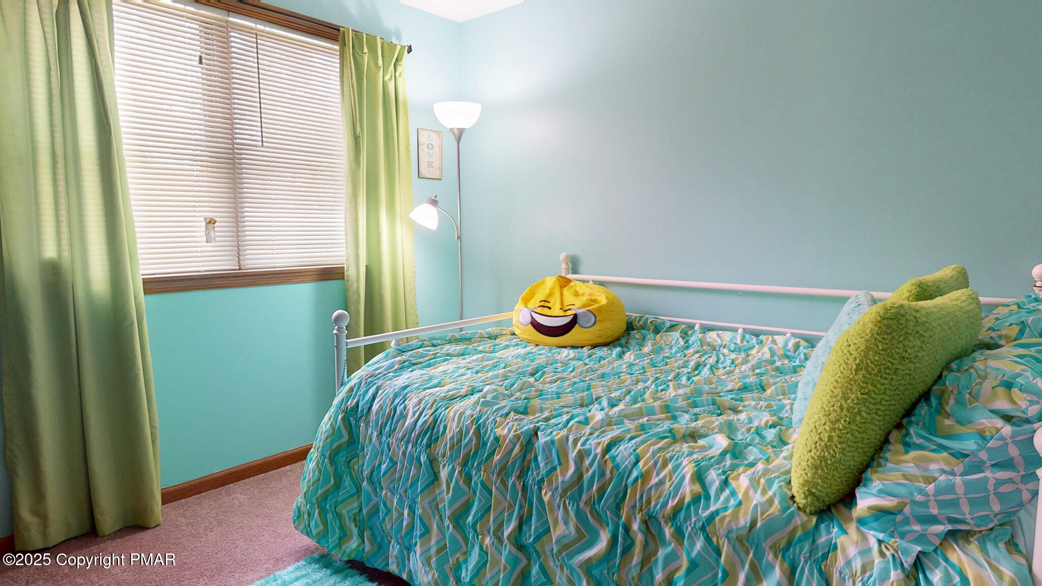 130 Foxfire Drive, Unit 103 Mount Pocono, PA 18344 - Photo 26 of 38 a bedroom with a bed and a window
