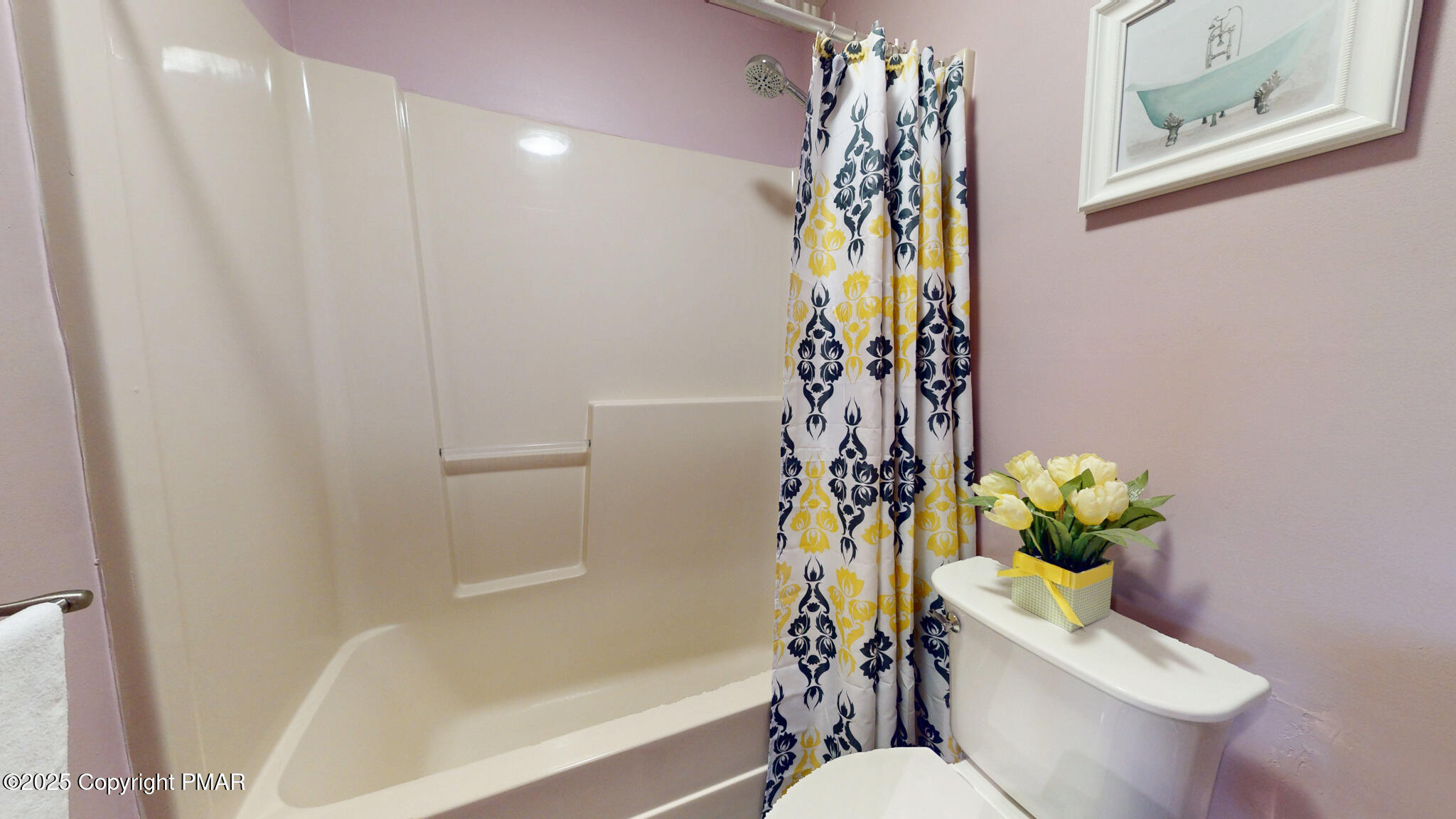 130 Foxfire Drive, Unit 103 Mount Pocono, PA 18344 - Photo 34 of 38 a bathroom with a toilet a sink and bathtub