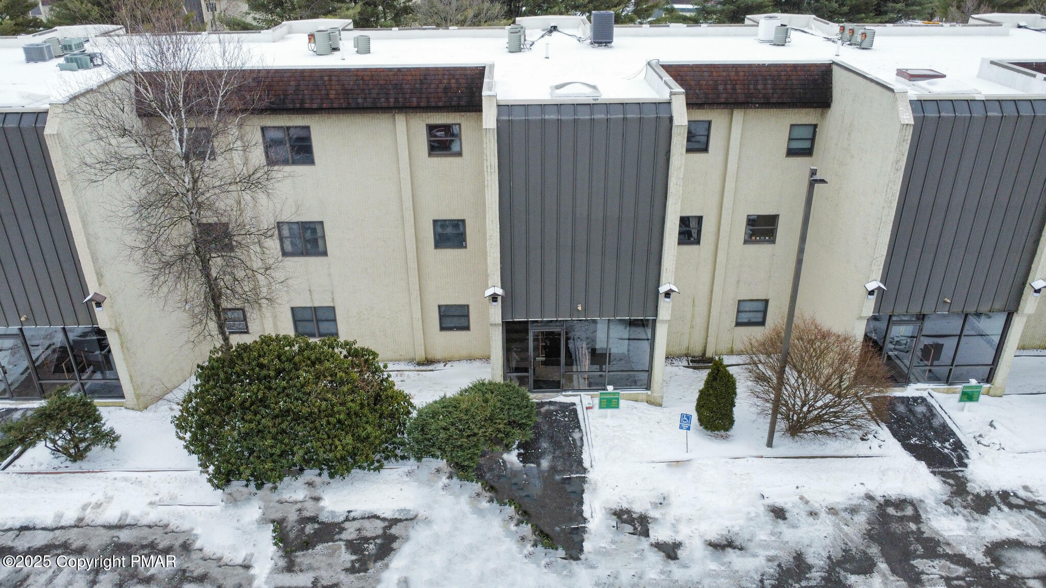 130 Foxfire Drive, Unit 103 Mount Pocono, PA 18344 - Photo 37 of 38 a view of a house with outdoor space