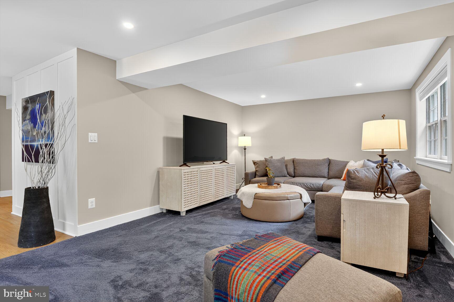 4618 Twinbrook Road Fairfax, VA 22032 - Photo 11 of 24 a living room with furniture and a flat screen tv