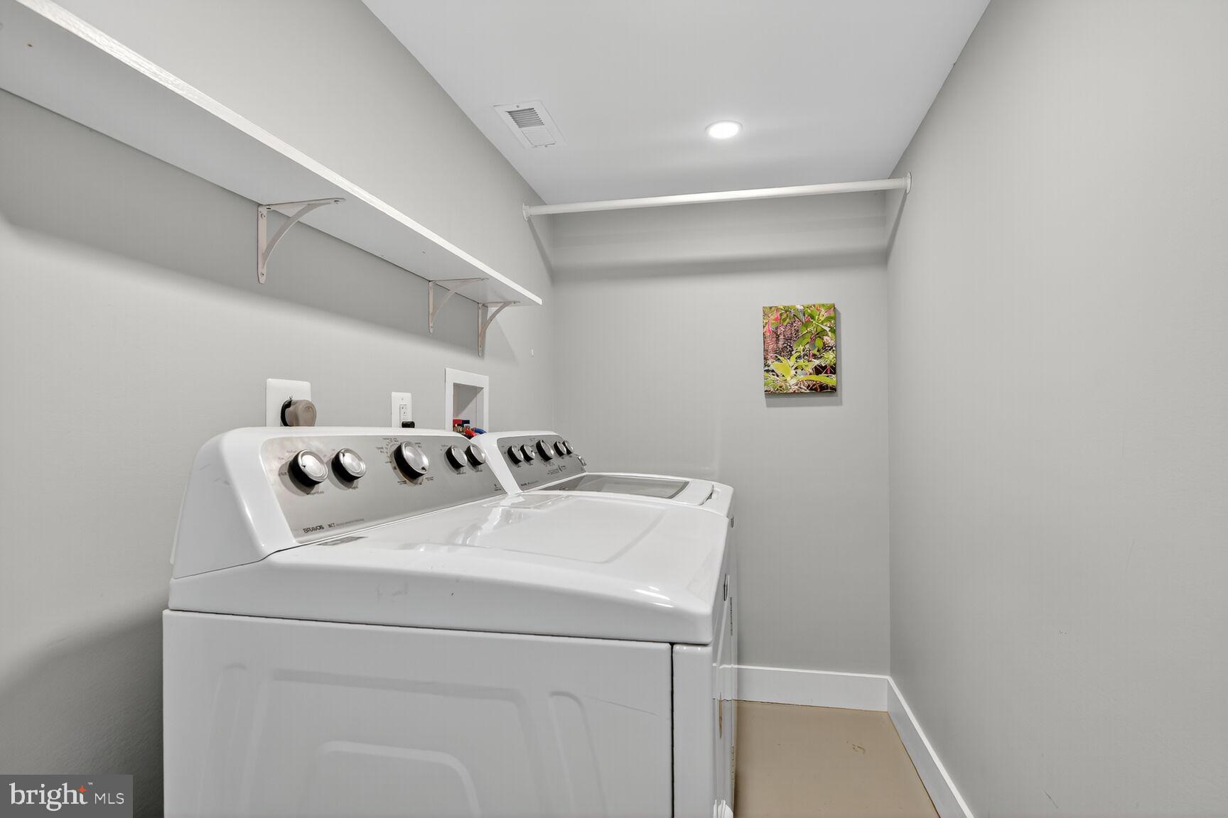 4618 Twinbrook Road Fairfax, VA 22032 - Photo 21 of 24 a utility room with dryer and washer