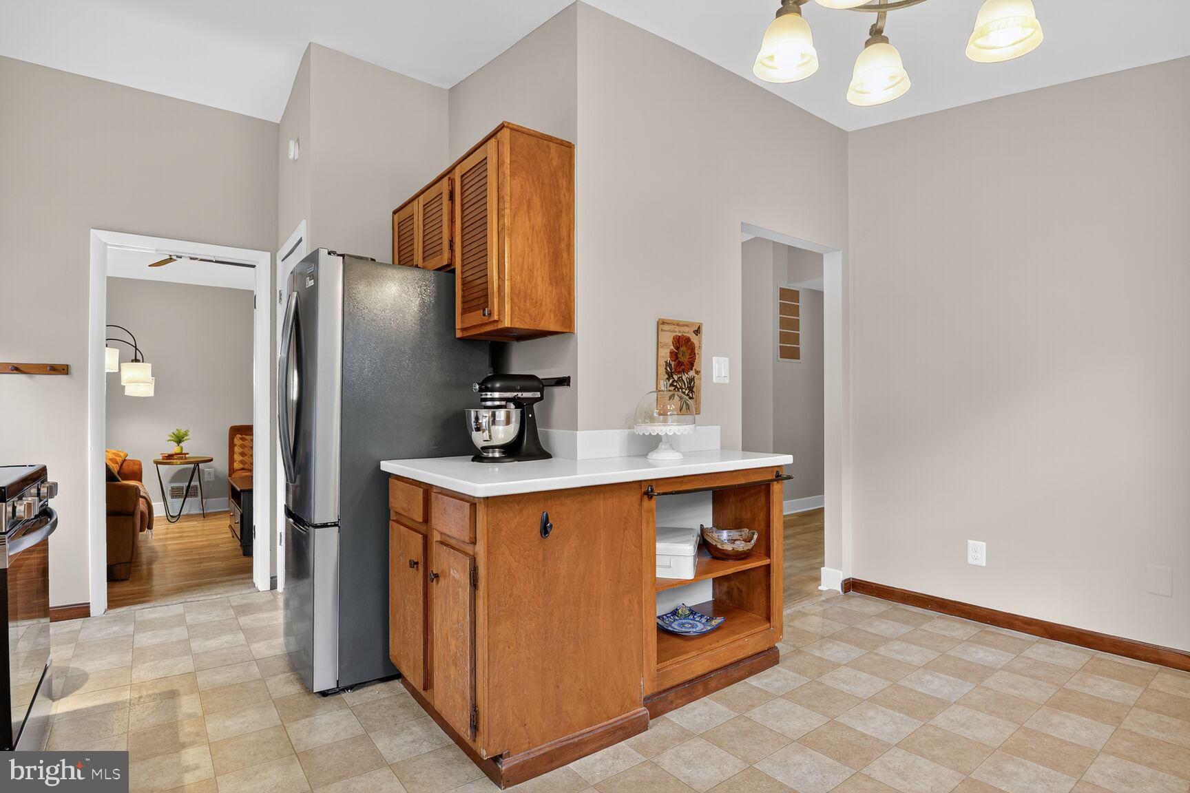 4618 Twinbrook Road Fairfax, VA 22032 - Photo 7 of 24 a kitchen with stainless steel appliances a stove and a refrigerator