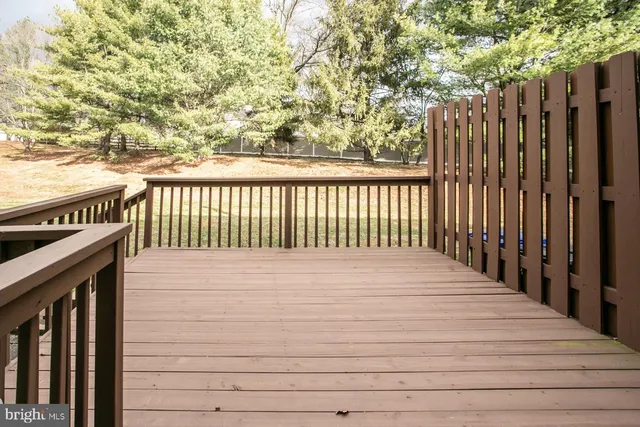 a view of a wooden fence