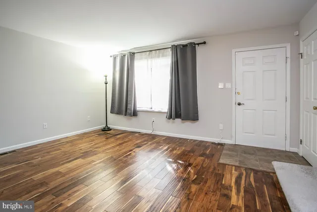 a view of an empty room and window