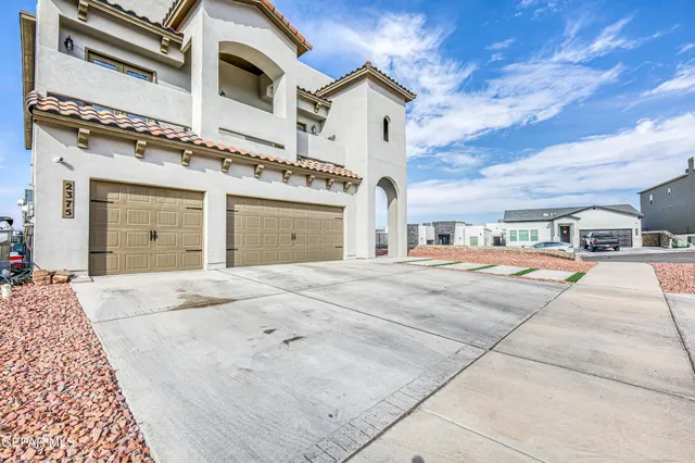a building with trees in front of it