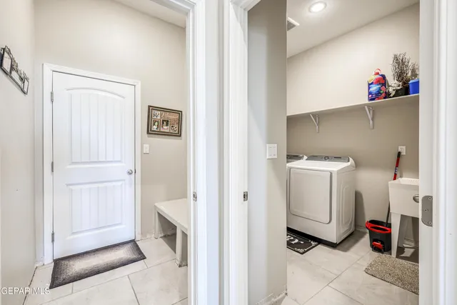 a living room with furniture and flat screen tv