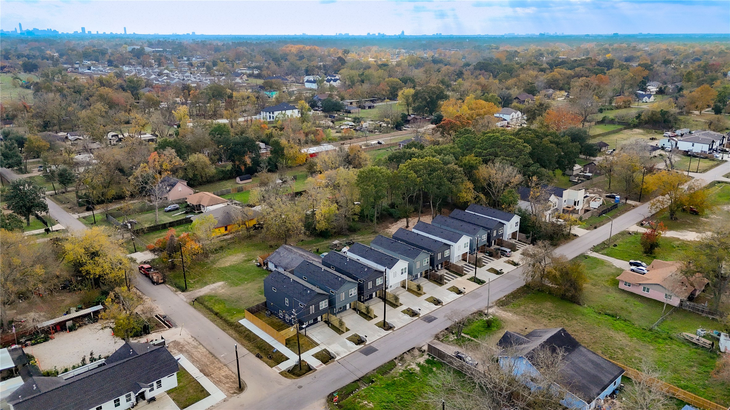 1203 Dewalt Street Houston, TX 77088 - Photo 21 of 26 an aerial view of multiple houses with yard