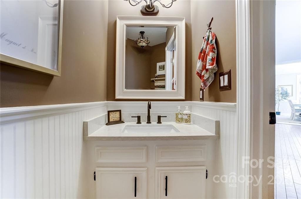 1517 Helms Shortcut Road Monroe, NC 28112 - Photo 21 of 45 a bathroom with a sink and a mirror