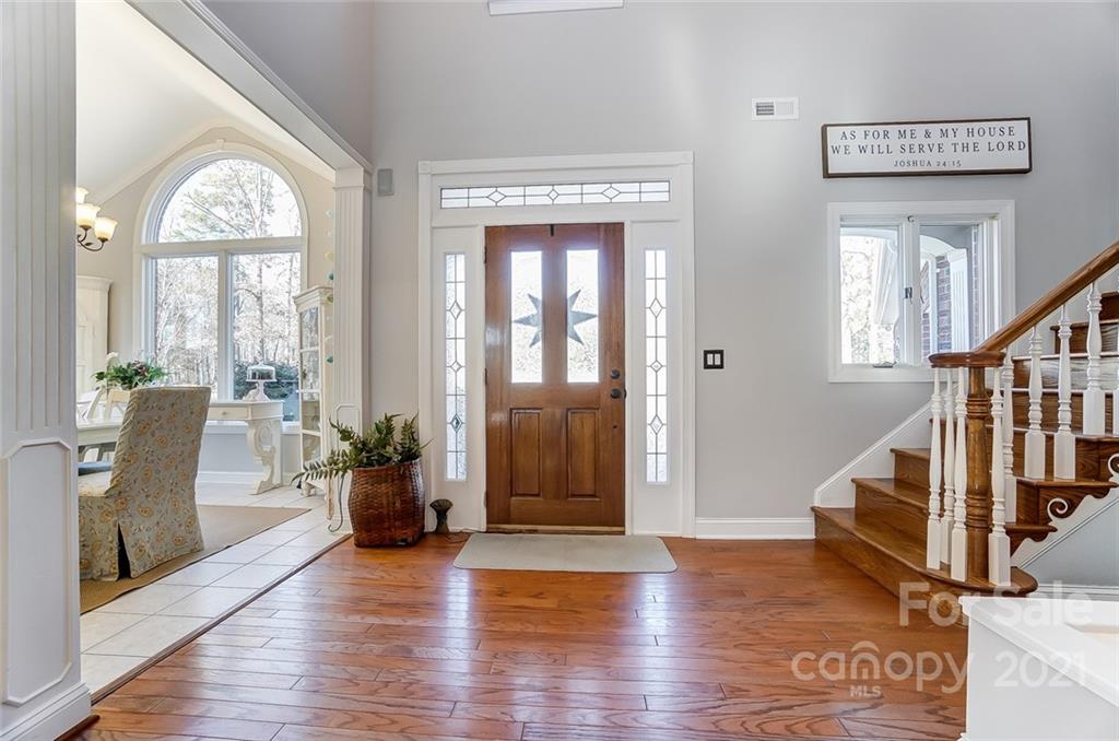 1517 Helms Shortcut Road Monroe, NC 28112 - Photo 4 of 45 a view of an entryway with wooden floor and windows