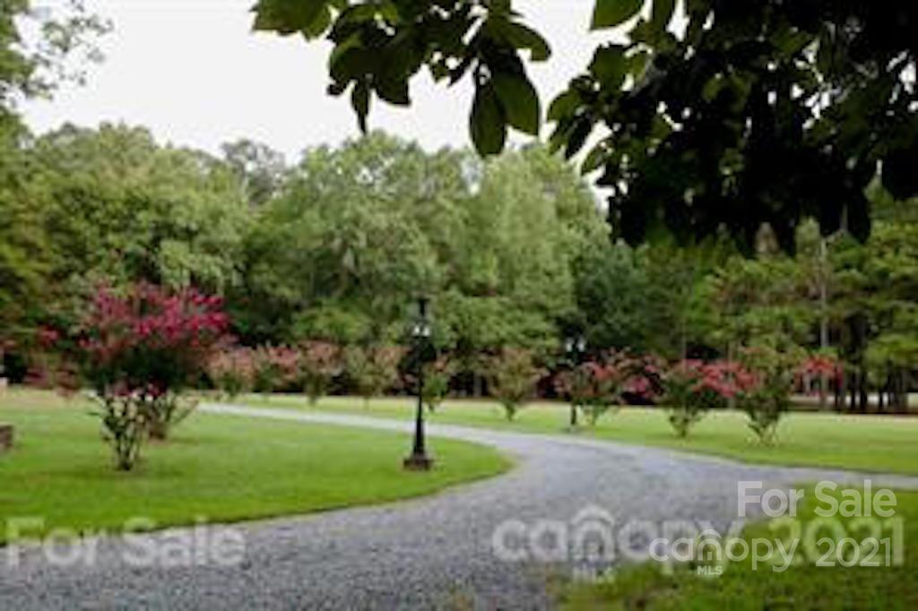 1517 Helms Shortcut Road Monroe, NC 28112 - Photo 44 of 45 a front view of a house with a yard