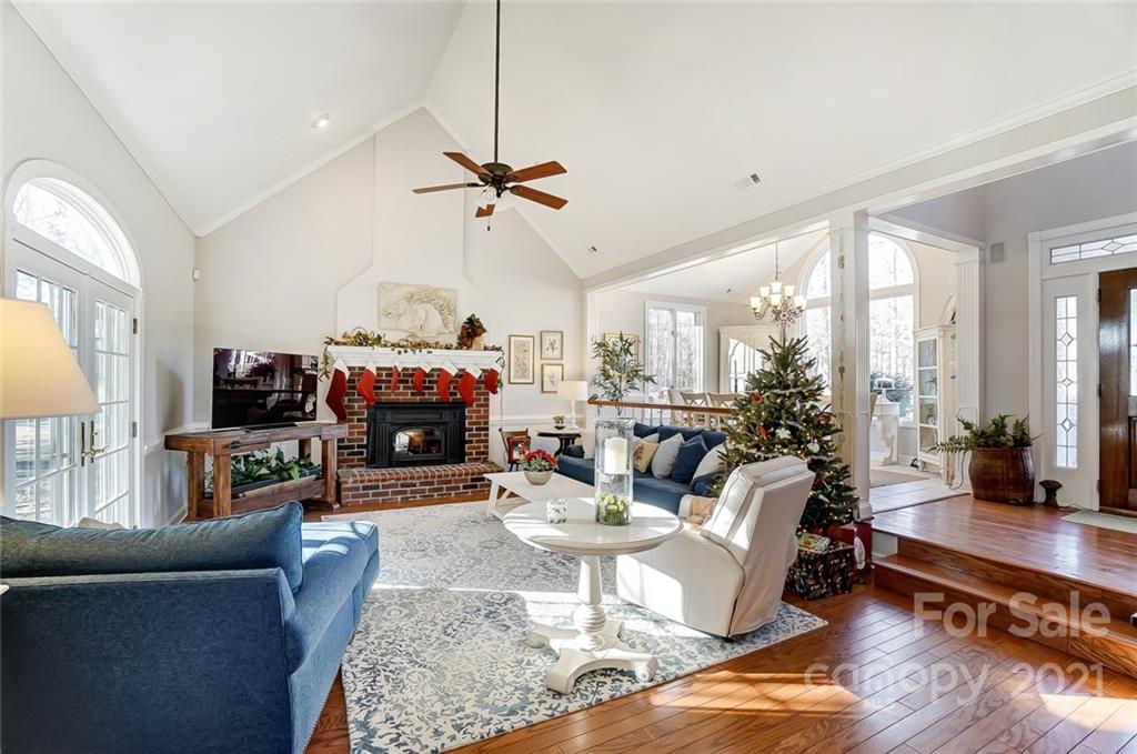 1517 Helms Shortcut Road Monroe, NC 28112 - Photo 6 of 45 a living room with furniture fireplace and a large window