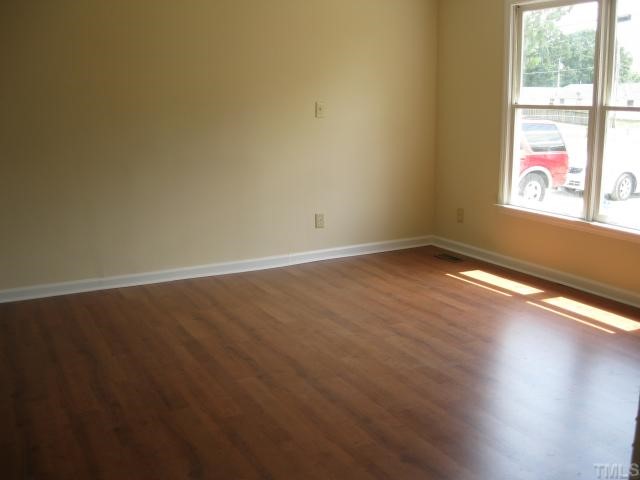 602 River Road Selma, NC 27576 - Photo 3 of 6 Large lovely Dining Room with laminate flooring and new paint.