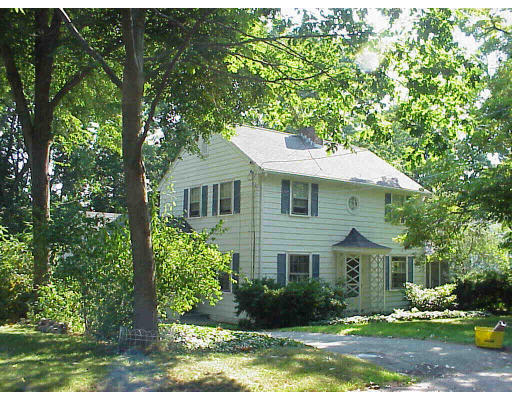 33 Independence Avenue Lexington, MA 02421 - Photo 1 of 18 a front view of a house with a yard