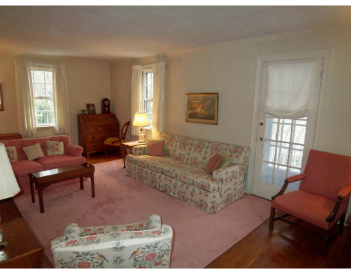 33 Independence Avenue Lexington, MA 02421 - Photo 3 of 18 a living room with furniture wooden floor and a window