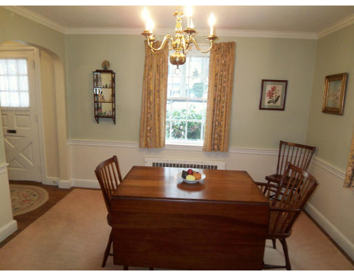 33 Independence Avenue Lexington, MA 02421 - Photo 7 of 18 a view of a dining room with furniture and chandelier