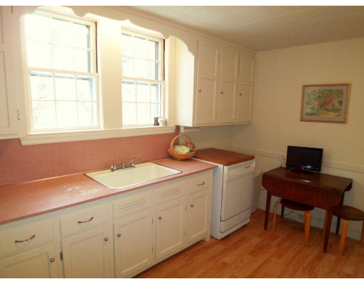 33 Independence Avenue Lexington, MA 02421 - Photo 8 of 18 a kitchen with a sink cabinets and a window