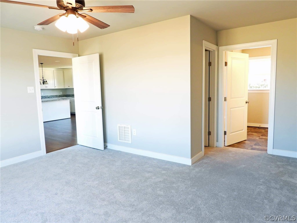 4608 Pin Oak Road Prospect, VA 23960 - Photo 15 of 29 a view of a room with a ceiling fan and entryway