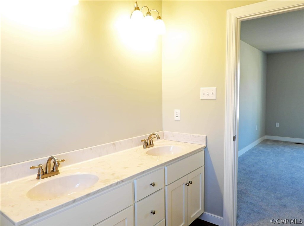 4608 Pin Oak Road Prospect, VA 23960 - Photo 17 of 29 a bathroom with a sink and a mirror